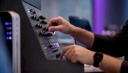1786211683867_Hands-adjusting-AI-model-fairness-controls.jpeg